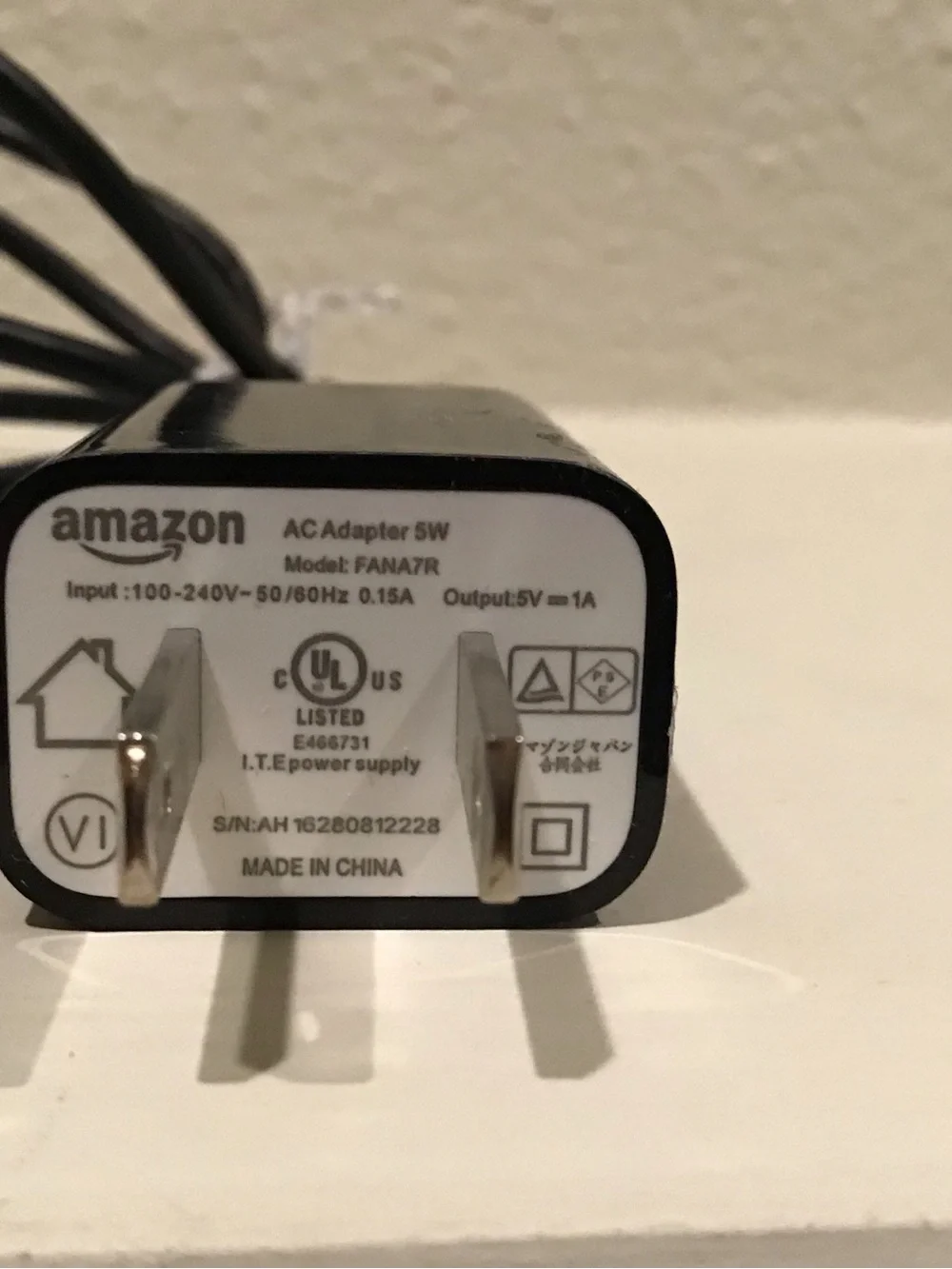 Amazon Black AC Adapter with White Label and cable.
